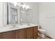 Modern bathroom with double vanity, and a separate shower at 144 Wooten Ave, Brighton, CO 80601