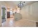 Bright kitchen featuring light fixtures, stainless steel appliances, and tile flooring at 2902 W Long Cir # B, Littleton, CO 80120