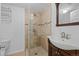 Basement bathroom with walk-in shower and vanity at 3998 Haddon Rd, Denver, CO 80205