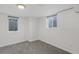 Finished basement bedroom with grey carpet and window at 3998 Haddon Rd, Denver, CO 80205