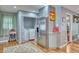 Convenient laundry area with a stainless steel refrigerator and modern washer and dryer at 5610 Brentwood St, Arvada, CO 80002