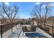 Spacious rooftop deck with stylish outdoor seating, offering scenic views of the surrounding cityscape and mountains at 4426 Utica St, Denver, CO 80212