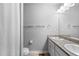 Simple bathroom featuring double sinks and a shower-tub combo at 26818 E 1St Pl, Aurora, CO 80018