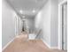 Upstairs hallway with recessed lighting, carpeted floor, and doors to bedrooms at 26818 E 1St Pl, Aurora, CO 80018