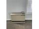 A close up of a wall heater, carpeted floors and a window with blinds at 4445 E Florida Ave, Denver, CO 80222