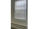 Window view with blinds to control natural light and a radiator heater at 4445 E Florida Ave, Denver, CO 80222