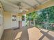 Inviting deck space is perfect for outdoor enjoyment, featuring a ceiling fan, railing, and access to lush surroundings at 6844 S Detroit Cir, Centennial, CO 80122