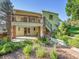 Backyard with patio, stairway, landscaping, and exterior view of the home at 6844 S Detroit Cir, Centennial, CO 80122