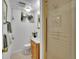 Well-maintained bathroom features a shower with glass door and classic fixtures, ensuring functionality at 6844 S Detroit Cir, Centennial, CO 80122