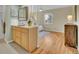 Bathroom featuring updated vanity and cabinets with view to the bedroom space at 6844 S Detroit Cir, Centennial, CO 80122
