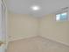 Bright bedroom with neutral walls and a window providing natural light, ideal for a peaceful retreat at 6844 S Detroit Cir, Centennial, CO 80122