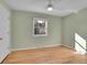 Empty light green bedroom featuring natural light from the window and ceiling fan at 6844 S Detroit Cir, Centennial, CO 80122