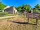 Cherry Knolls Swim Club sign and building, featuring chain-link fence and minimal landscaping at 6844 S Detroit Cir, Centennial, CO 80122