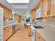 Functional kitchen with ample cabinet storage, modern appliances, and a cozy breakfast nook at 6844 S Detroit Cir, Centennial, CO 80122