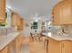 Functional kitchen with ample cabinet storage, modern appliances, and a cozy breakfast nook at 6844 S Detroit Cir, Centennial, CO 80122