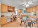 Spacious kitchen with ample storage, breakfast bar, wine rack, and stainless steel appliances at 6844 S Detroit Cir, Centennial, CO 80122