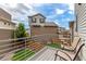 Enjoy outdoor living on this home's back deck with room for seating and relaxing at 10102 Yampa Ct, Commerce City, CO 80022