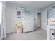 Comfortable bedroom with white dresser, ample storage, and natural light at 10102 Yampa Ct, Commerce City, CO 80022