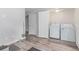 Convenient laundry area with modern washer and dryer, offering functionality and ease at 10102 Yampa Ct, Commerce City, CO 80022