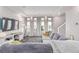 Spacious living room with large windows offering natural light at 10102 Yampa Ct, Commerce City, CO 80022