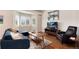 Inviting living room with high ceilings, bay window, comfortable seating, and stylish decor at 11181 W Crestline Dr, Littleton, CO 80127