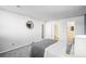 Bedroom with gray carpet and ensuite bathroom at 12470 E Cornell Ave # 104, Aurora, CO 80014