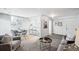 Inviting living and dining area with an open layout, modern furnishings, and plenty of natural light at 12470 E Cornell Ave # 104, Aurora, CO 80014