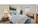 Cozy bedroom with a large window, artwork, and soothing colors, creating a serene and restful atmosphere at 2616 Loon Cir, Castle Rock, CO 80104
