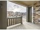 View from the front porch showcasing the neighborhood and featuring stone accents on the pillars at 2616 Loon Cir, Castle Rock, CO 80104