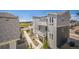 Aerial view of modern townhomes featuring private balconies and walkways at 18211 E 51St Ave, Denver, CO 80249