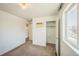 Cozy bedroom offering closet space, neutral decor and lots of natural light at 18211 E 51St Ave, Denver, CO 80249