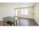 Bright dining room area with wood flooring and an open layout at 18211 E 51St Ave, Denver, CO 80249