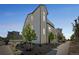 Exterior of a modern, multi-story home with well-maintained landscaping and stylish architectural design at 18211 E 51St Ave, Denver, CO 80249