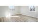 Bright bedroom with large windows and light flooring, offering a comfortable space at 3299 S Forest St, Denver, CO 80222