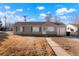 Charming single-story home with neutral siding and a well-maintained front yard at 3299 S Forest St, Denver, CO 80222