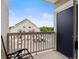 Balcony features an outdoor seating area with views of the parking area at 1801 S Dunkirk St # 205, Aurora, CO 80017