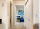 Bright bedroom with a world map, carpeted floors, and a comfortable bed at 1801 S Dunkirk St # 205, Aurora, CO 80017
