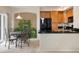 Lovely kitchen featuring dark countertops and stainless steel appliances at 1801 S Dunkirk St # 205, Aurora, CO 80017