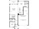 First floor plan showcasing a two-story great room, a kitchen, and a three-car tandem garage at 318 Welded Tuff Trl, Castle Rock, CO 80104