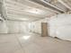 Unfinished basement featuring concrete floors and exposed ceiling at 791 N Tempe St, Aurora, CO 80018