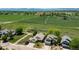 Aerial view highlighting a home surrounded by fields and mountains, offering serene landscape views at 1264 Banner Cir, Erie, CO 80516