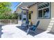Charming outdoor deck with seating, blue trim, and a striped awning, perfect for relaxing at 1264 Banner Cir, Erie, CO 80516