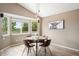 This dining area features ample natural light and backyard views at 1264 Banner Cir, Erie, CO 80516