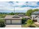 Charming single-Gathering home with a spacious three-car garage and mountain views in the background at 1264 Banner Cir, Erie, CO 80516