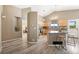 Bright eat-in kitchen features granite countertops, stainless appliances, and a cozy breakfast bar at 1264 Banner Cir, Erie, CO 80516