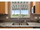 Kitchen sink with awning window shows a great view of the country at 1264 Banner Cir, Erie, CO 80516