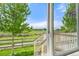 Beautiful backyard view from inside the home's sliding glass door at 1264 Banner Cir, Erie, CO 80516