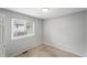 Cozy bedroom featuring carpet flooring and a window, offering a simple and comfortable space at 17058 Hastings Ct, Parker, CO 80134