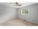 Clean bedroom with large windows and a ceiling fan for ample light and air flow at 17058 Hastings Ct, Parker, CO 80134
