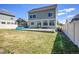 Spacious fenced backyard with a large patio, ideal for outdoor gatherings at 19155 Robins Dr, Denver, CO 80249